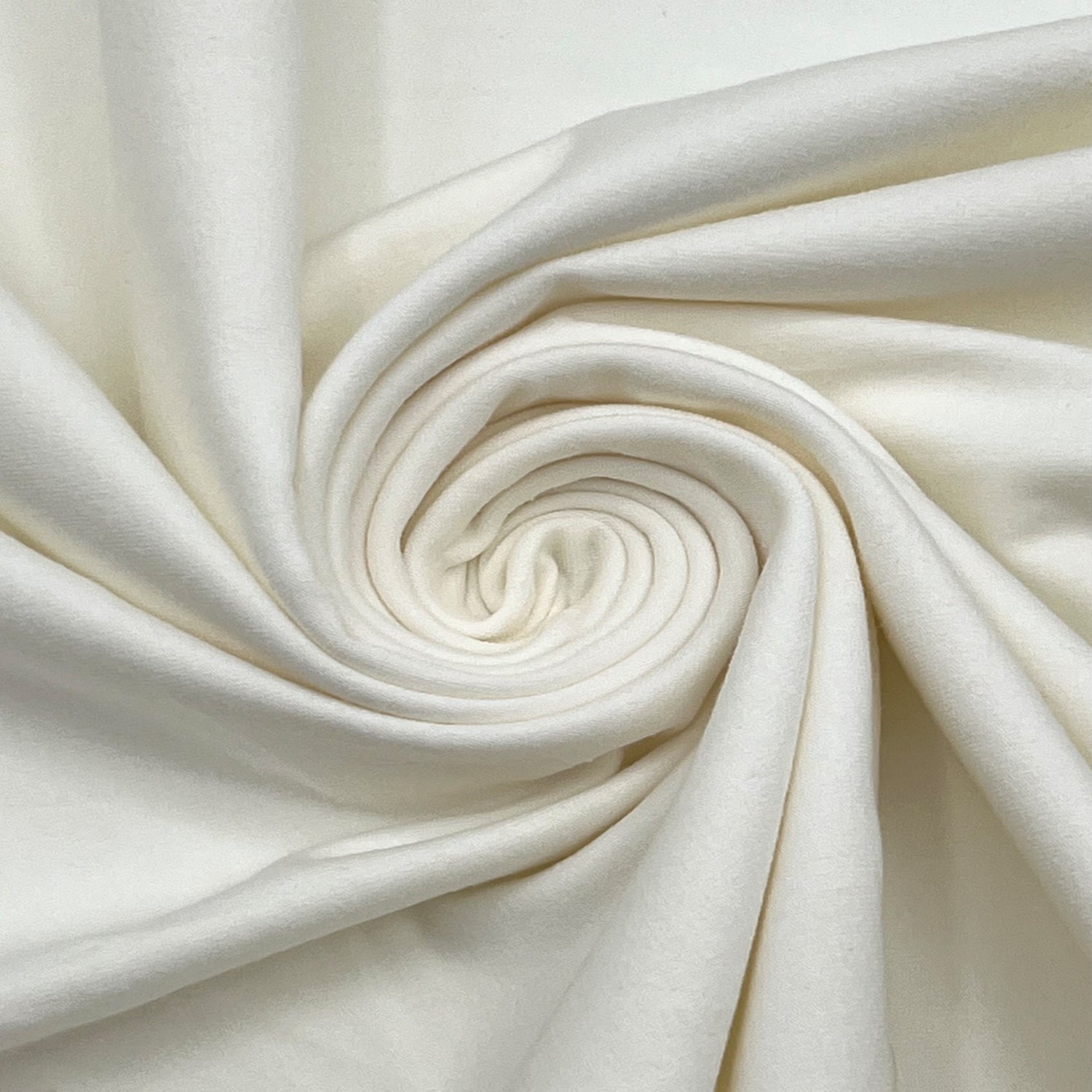 Close-up of white fabric with folds