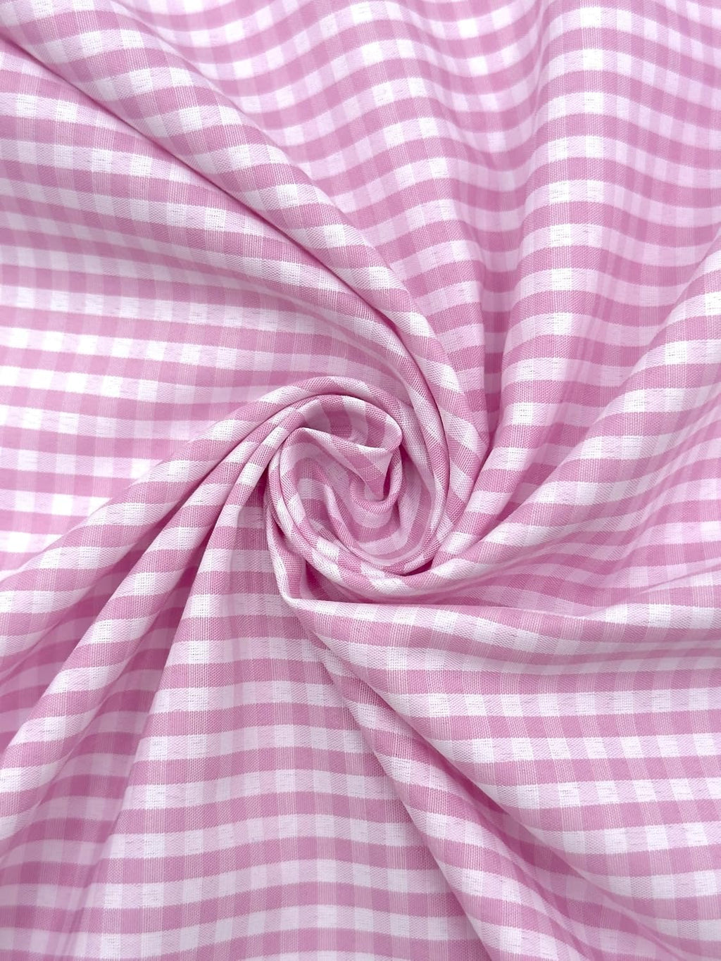 Baby Pink poly-cotton gingham fabric with 1/8-inch checks
