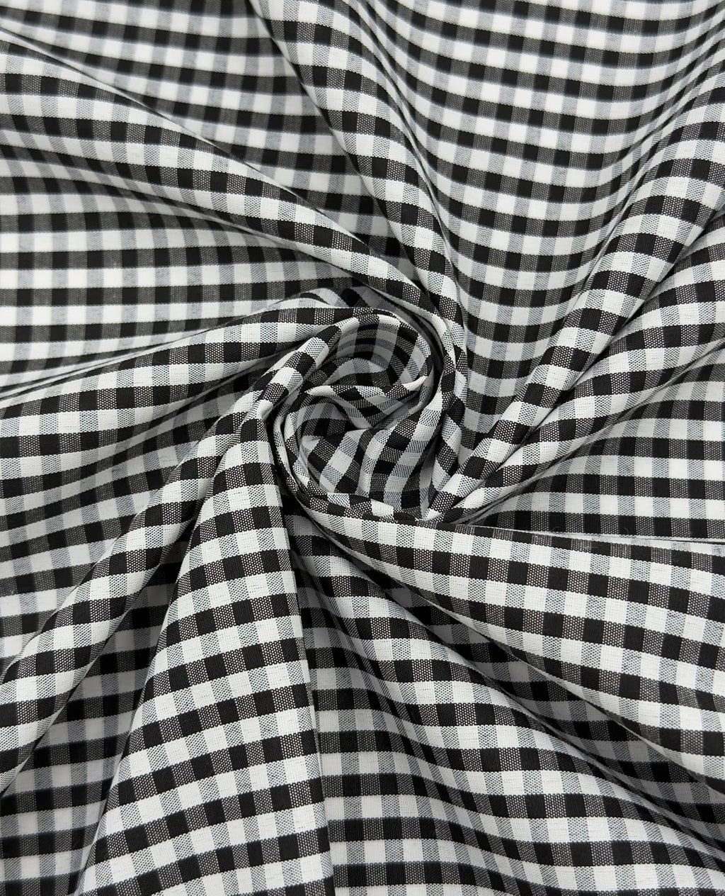 Black poly-cotton gingham fabric with 1/8-inch checks