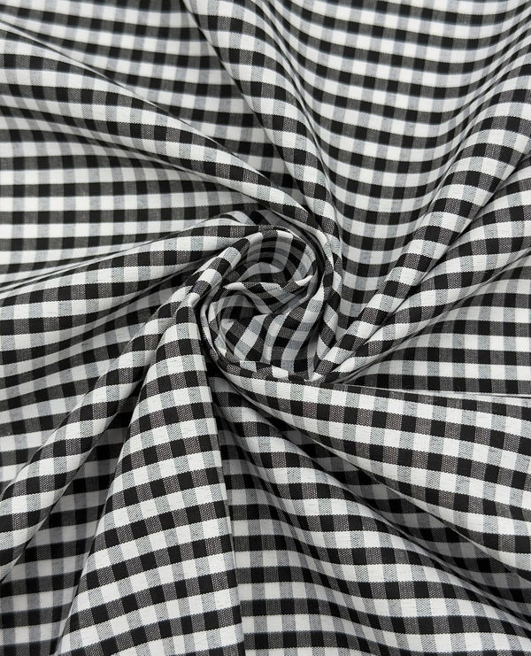 Black poly-cotton gingham fabric with 1/8-inch checks